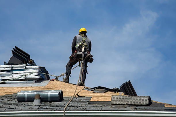 Professional Roof Replacement technician working in Ahsahka, ID